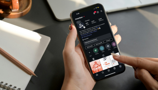 Woman looking at rTraction's instagram